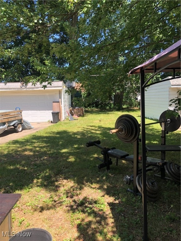 view of yard with a garage