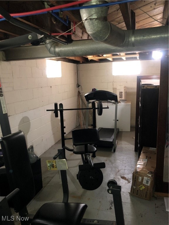 workout room with concrete flooring