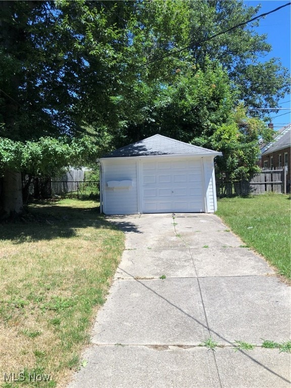 garage with a yard