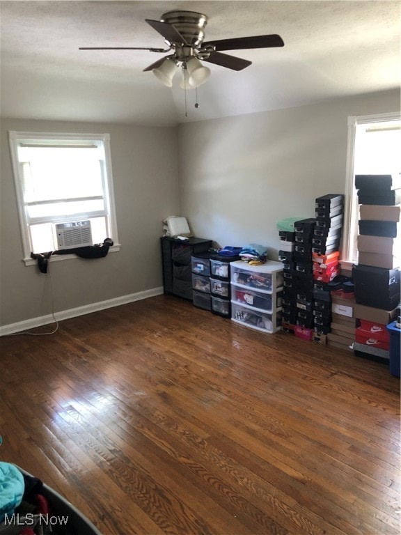 home office featuring ceiling fan, dark hardwood / wood-style floors, and plenty of natural light