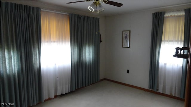 spare room featuring ceiling fan