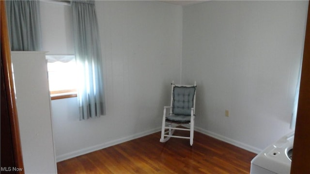 unfurnished room with dark hardwood / wood-style floors