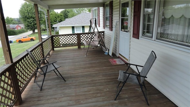 wooden terrace with covered porch