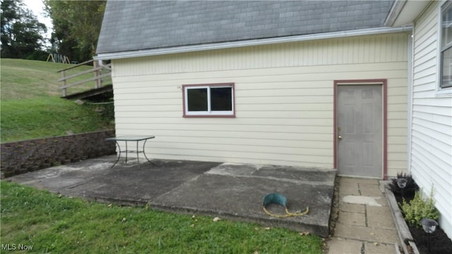 exterior space featuring a yard and a patio