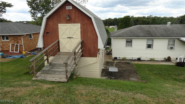 view of outdoor structure with a yard