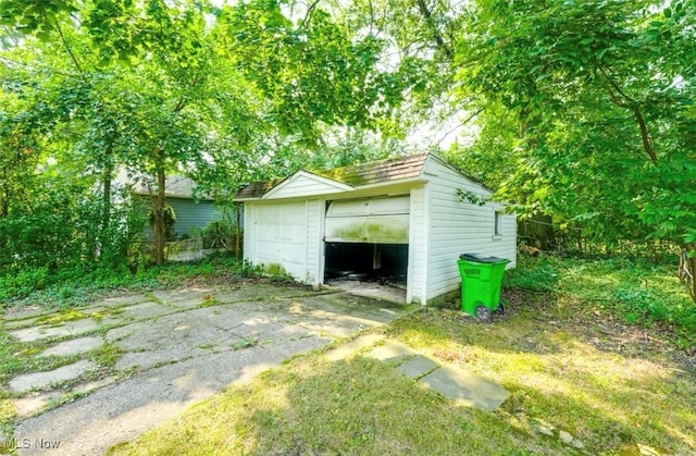 view of outbuilding with a garage