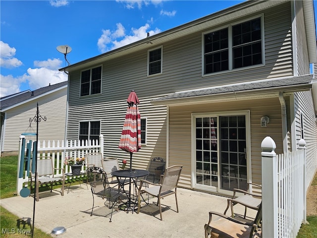 rear view of property with a patio area