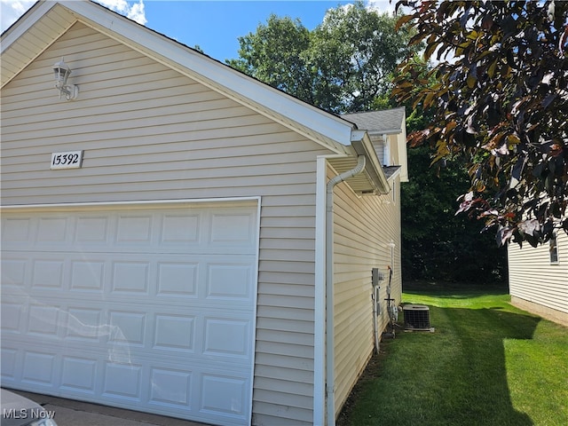 garage with a lawn