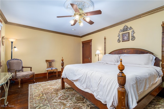 bedroom with ceiling fan, dark wood-type flooring, and ornamental molding