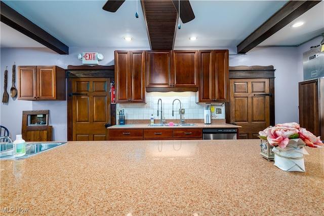 kitchen with beam ceiling, stainless steel dishwasher, sink, and ceiling fan