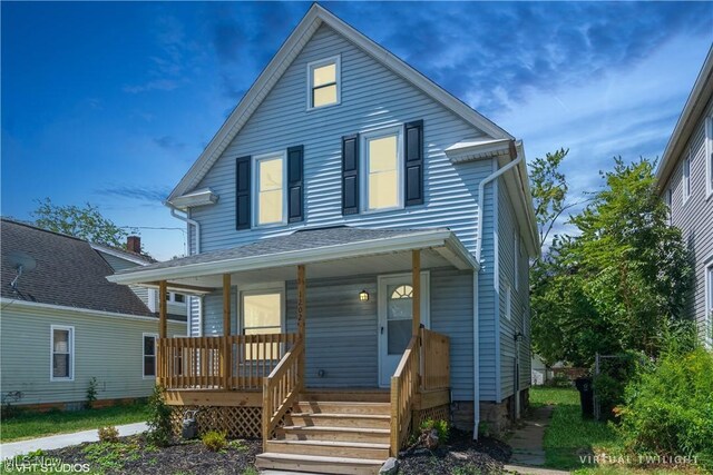 view of property with covered porch