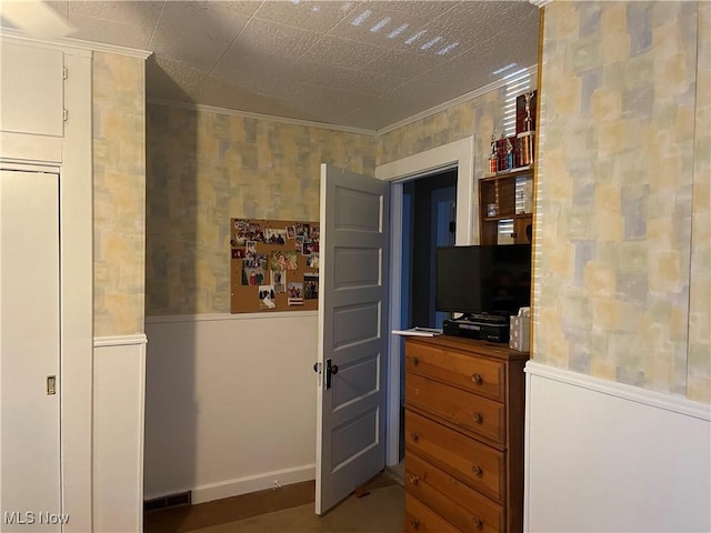 bedroom with crown molding