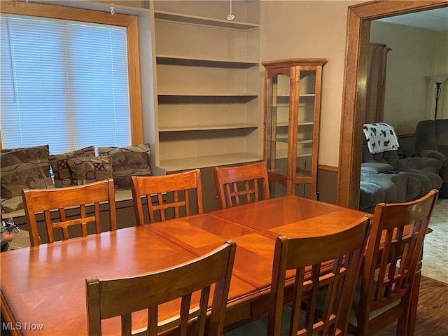 dining room with hardwood / wood-style floors