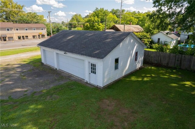 view of outdoor structure with a lawn