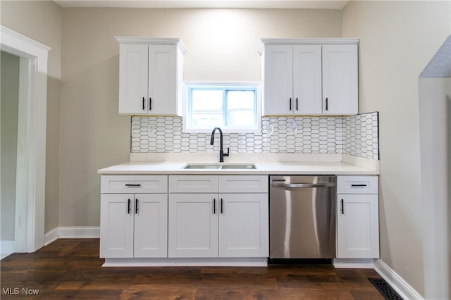 kitchen with sink, white cabinetry, dishwasher, and dark hardwood / wood-style floors