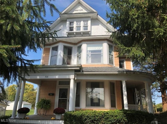 victorian house with a porch