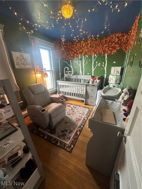 bedroom featuring hardwood / wood-style floors