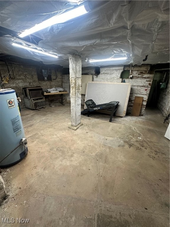 basement featuring water heater