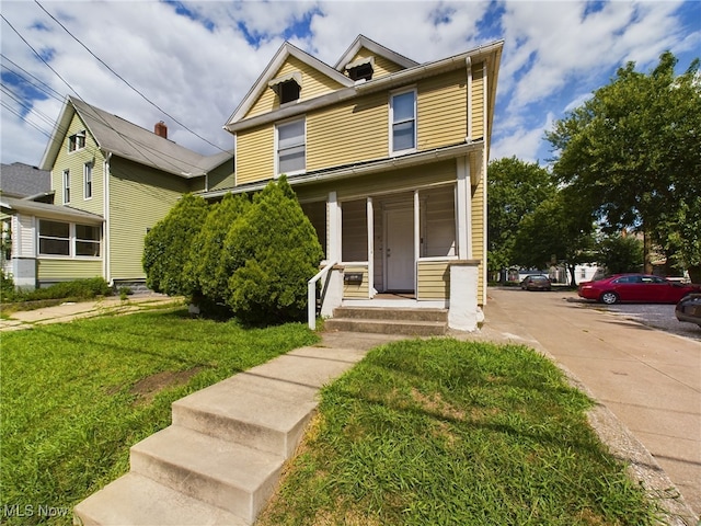 view of front facade featuring a front yard