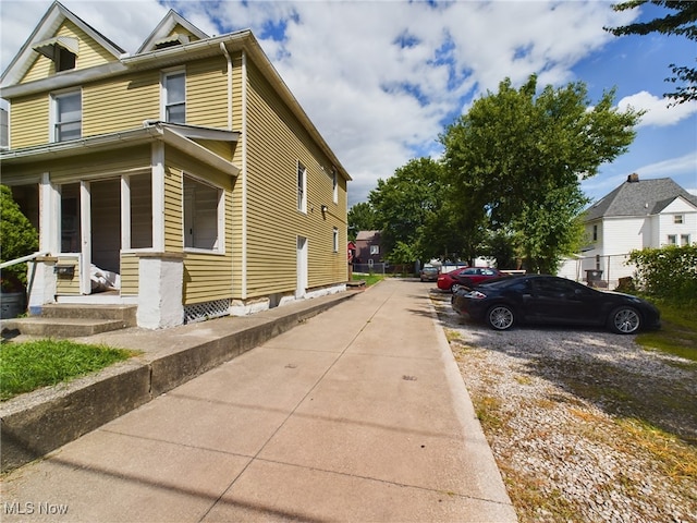 view of home's exterior featuring a porch