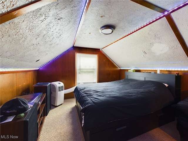 bedroom with carpet flooring and a textured ceiling