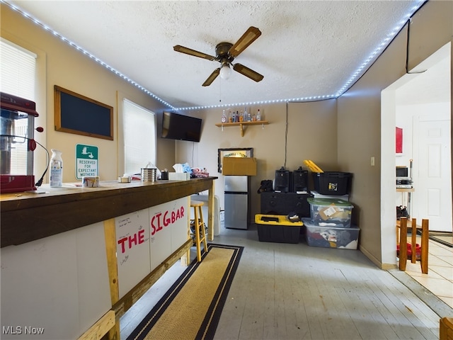 reception area with ceiling fan