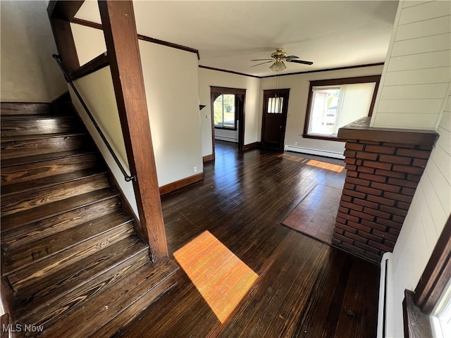 interior space with ceiling fan, crown molding, hardwood / wood-style floors, and a baseboard radiator