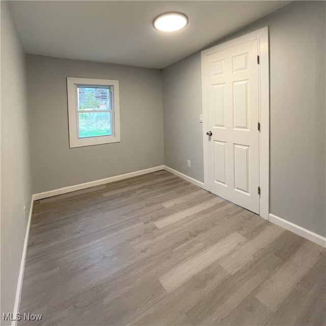 empty room featuring hardwood / wood-style floors