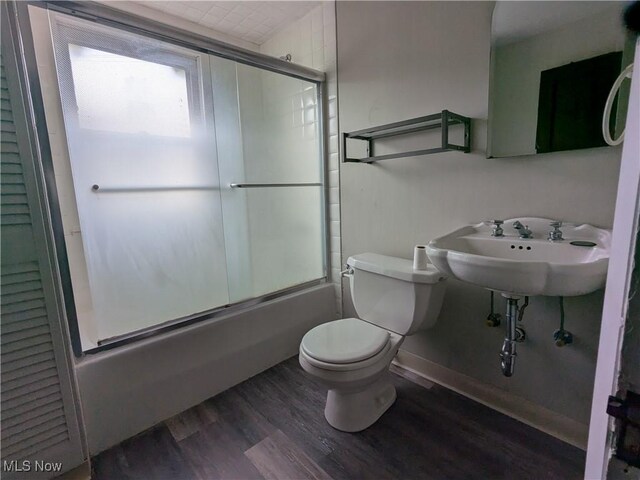 2572-2574 Mayfield Rd, Cleveland Heights, OH 44106 - full bath with combined bath / shower with glass door and wood finished floors