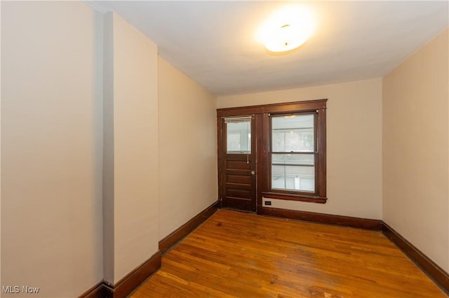 2572-2574 Mayfield Rd, Cleveland Heights, OH 44106 - doorway with wood finished floors and baseboards