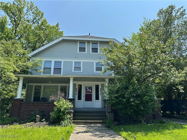 2572-2574 Mayfield Rd, Cleveland Heights, OH 44106 - american foursquare style home featuring covered porch