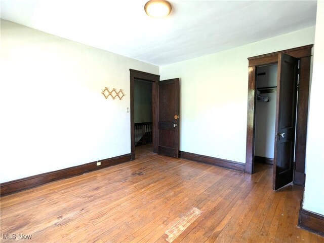 2572-2574 Mayfield Rd, Cleveland Heights, OH 44106 - unfurnished room with light wood-type flooring and baseboards