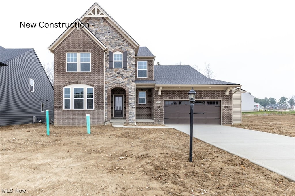 view of front of home with a garage