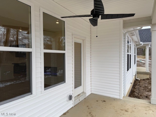 view of patio featuring ceiling fan