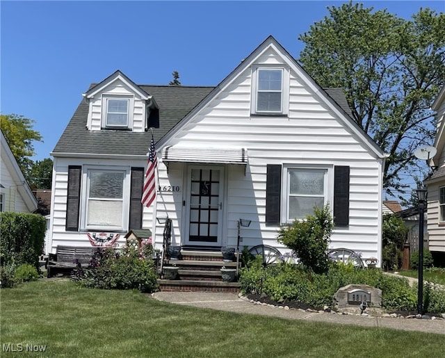 view of front of home with a front yard