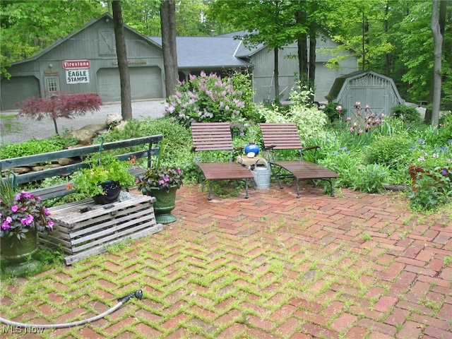 view of patio with a storage shed