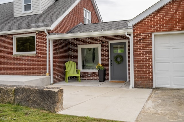 property entrance featuring a garage