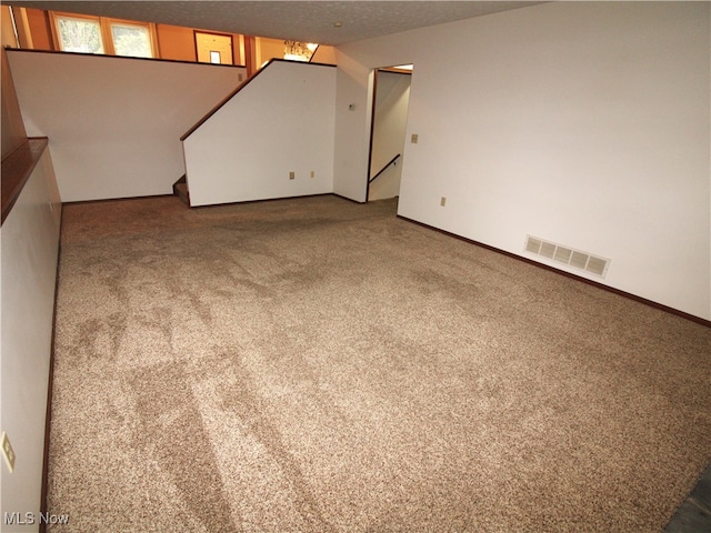 spare room with carpet flooring