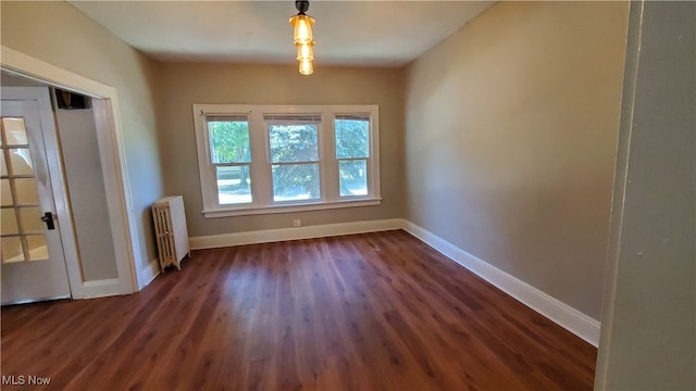 interior space featuring dark hardwood / wood-style floors and radiator