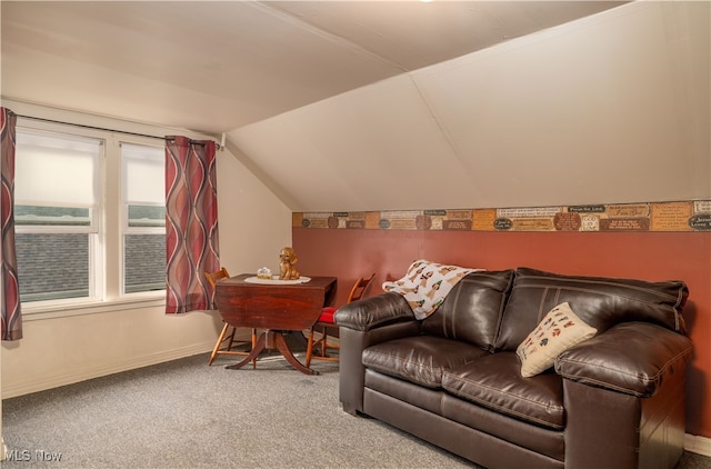 living room with carpet floors and vaulted ceiling