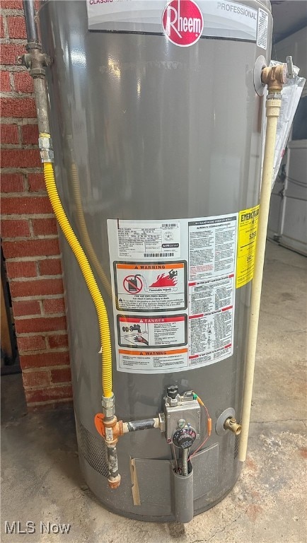 utility room with gas water heater