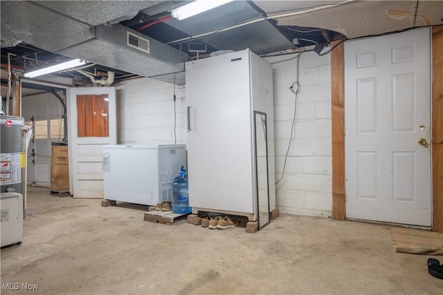 basement featuring refrigerator