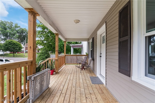 wooden deck with a porch