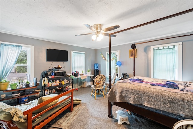 bedroom with light colored carpet, a textured ceiling, and ceiling fan