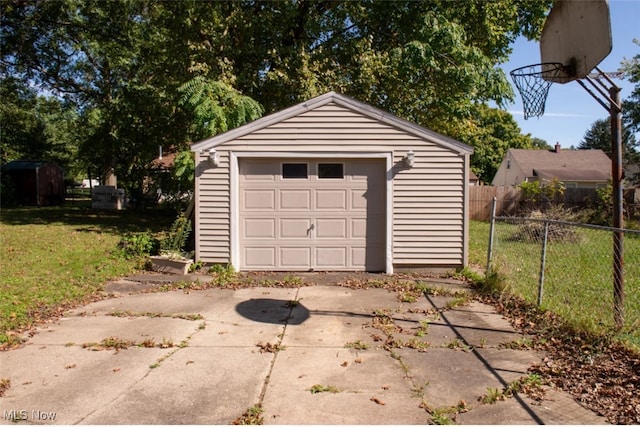 garage with a yard