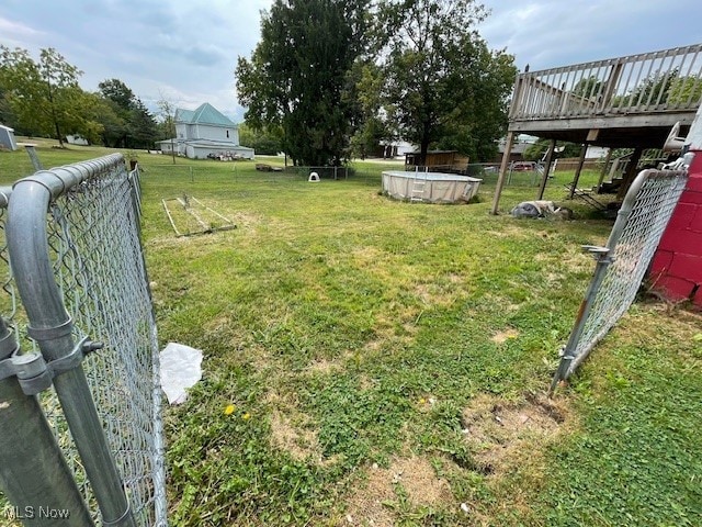 view of yard with a deck