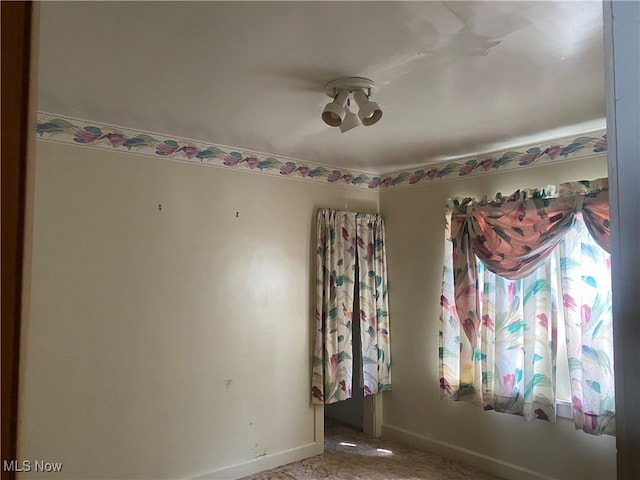 view of carpeted spare room