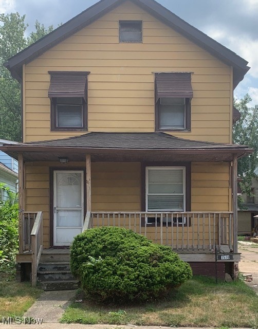 7510 Worley Ave, Cleveland, OH 44105 - view of front of house with a porch