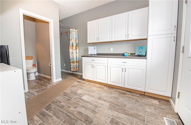 interior space featuring white cabinets