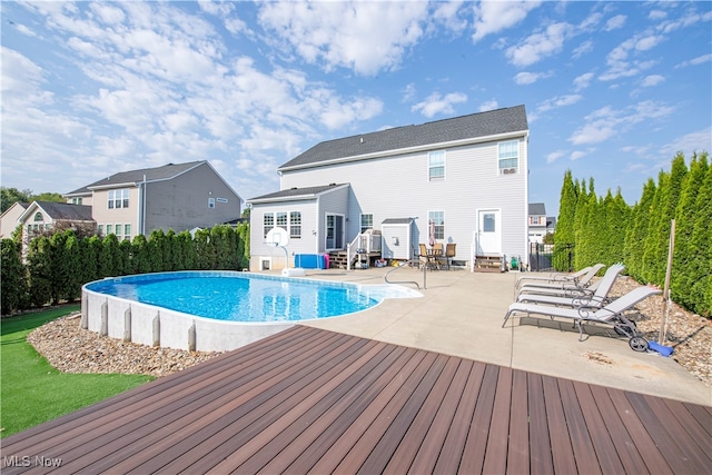 view of pool featuring a patio